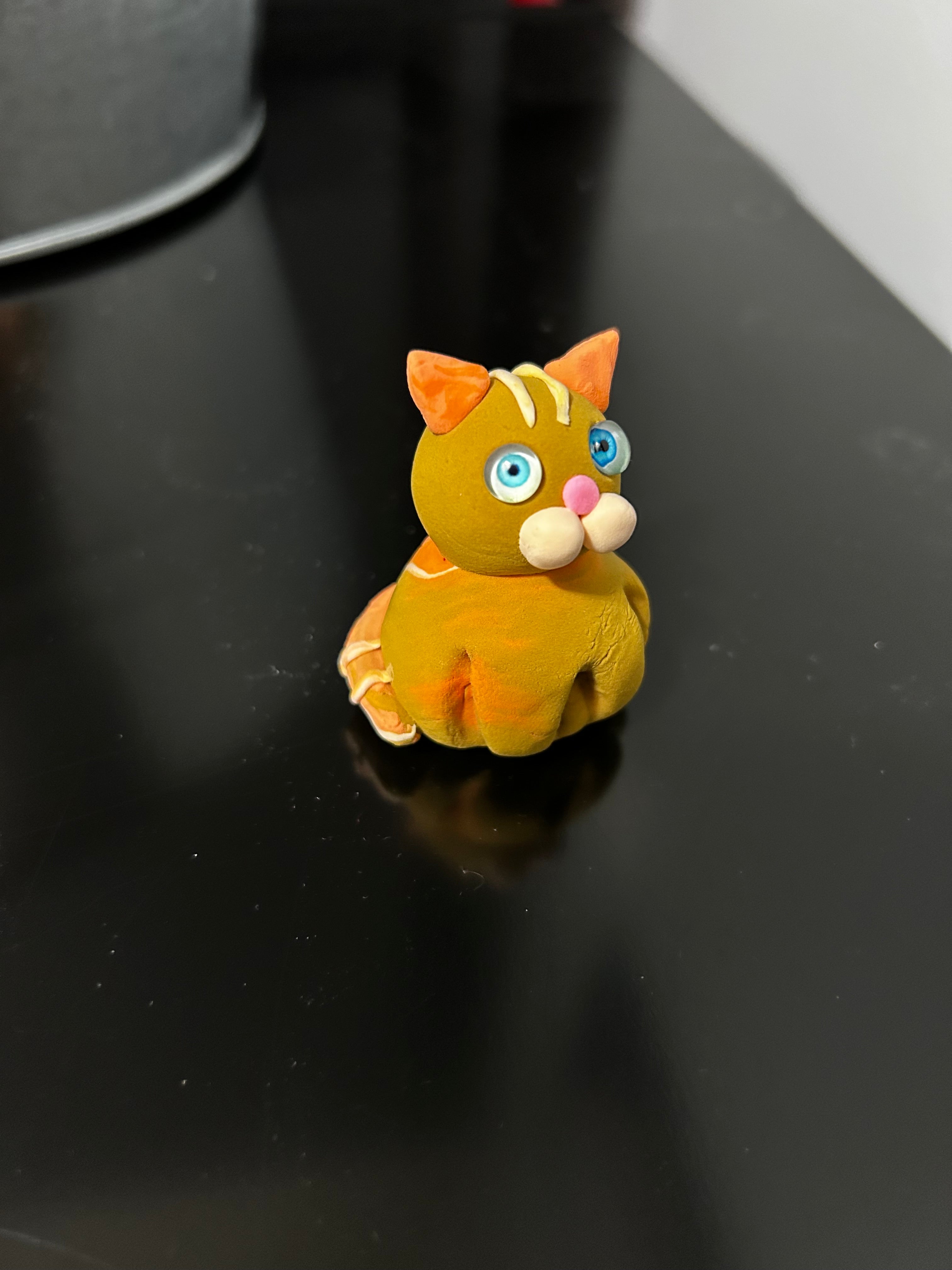 Polymer clay orange tabby cat miniature, face close-up