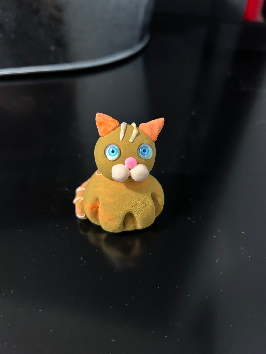 Polymer clay orange tabby cat miniature, side view