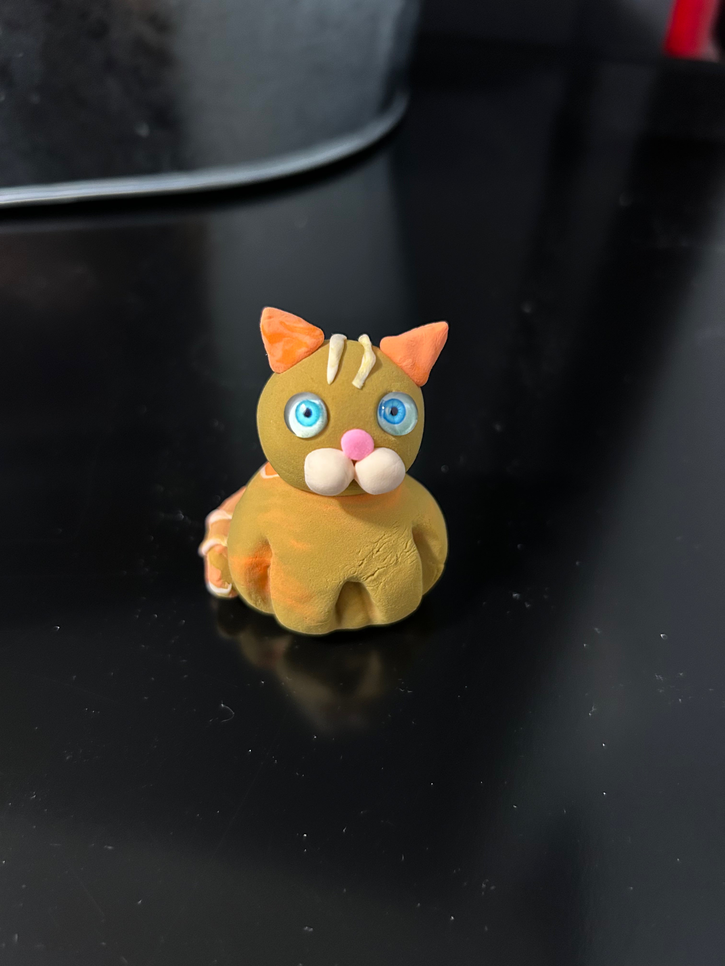 Polymer clay orange tabby cat miniature, side view